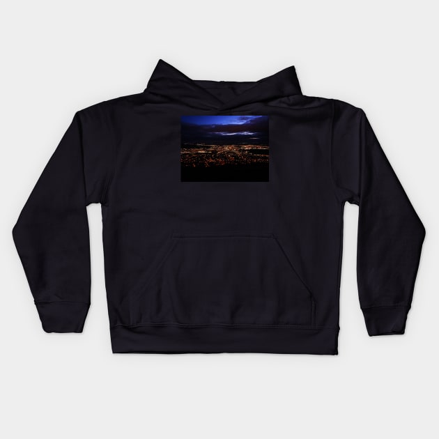 View of city lights from mountain top Kids Hoodie by Kate-P-